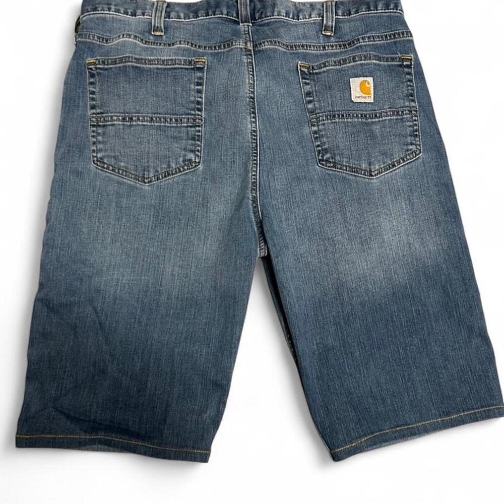 Size 36 blue denim Carhartt shorts with 12 inch inseam. Straight relaxed fit.